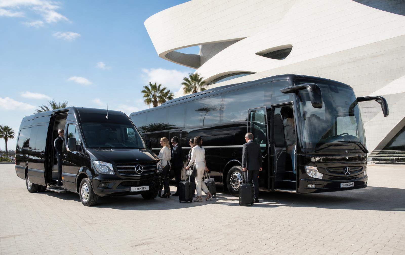 Executive Sprinter van and coach loading a business group in daylight